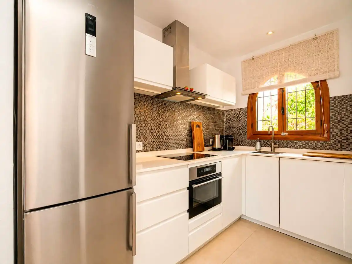 Cocina de Casa adosada en venta en L'Alfàs del Pi con Aire acondicionado, Calefacción y Jardín privado