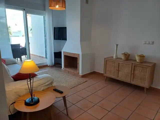 Sala de estar de Apartamento de alquiler en Islantilla con Aire acondicionado, Calefacción y Terraza