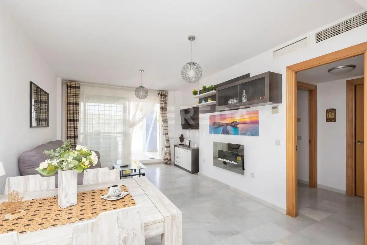 Living room of Ground floor for sale in Roquetas de Mar  with Air Conditioner, Private garden and Terrace