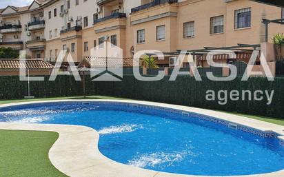 Swimming pool of Flat for sale in Dos Hermanas