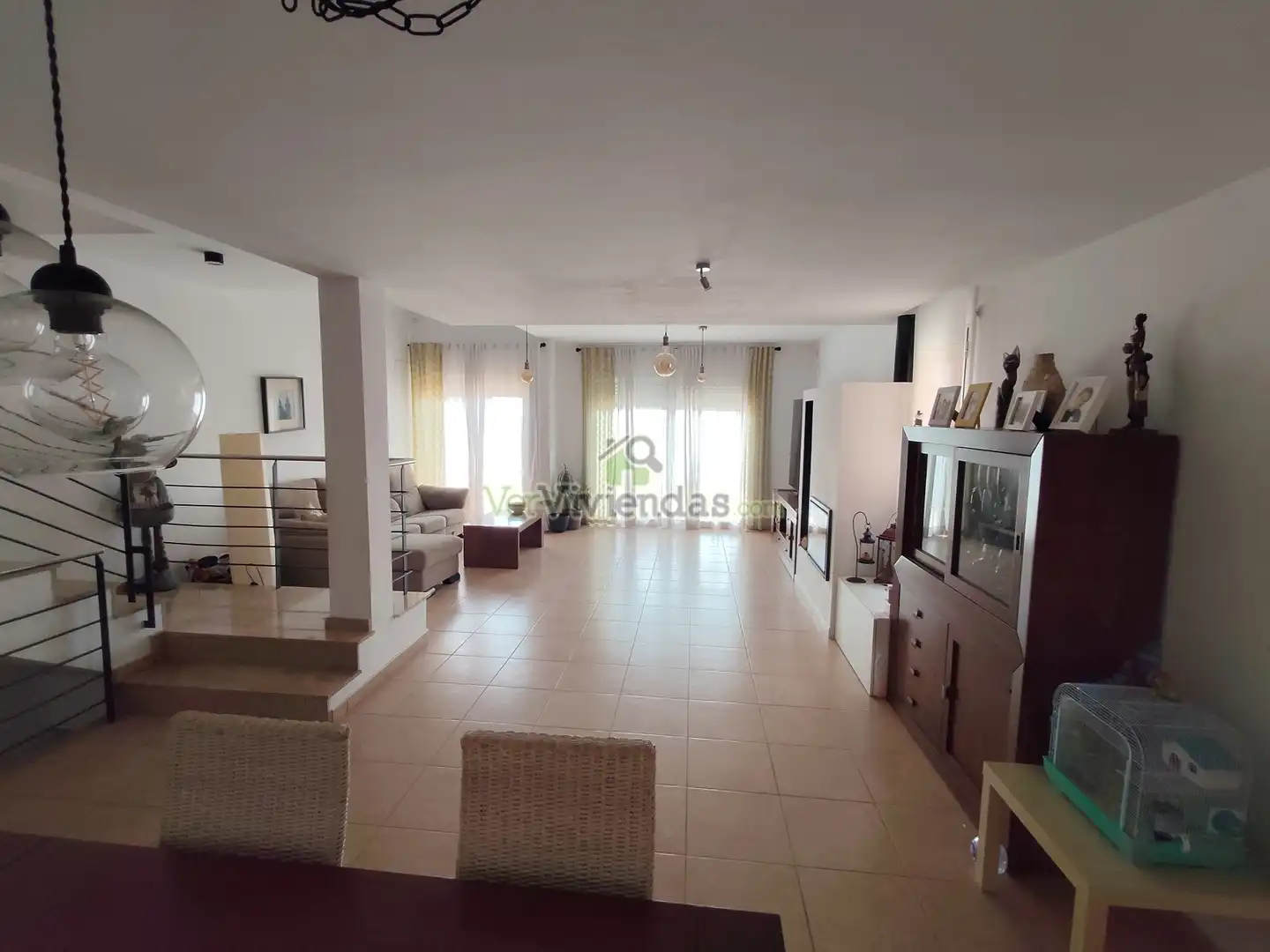 Sala d'estar de Casa adosada en venda en Castellar del Vallès amb Calefacció, Jardí privat i Terrassa