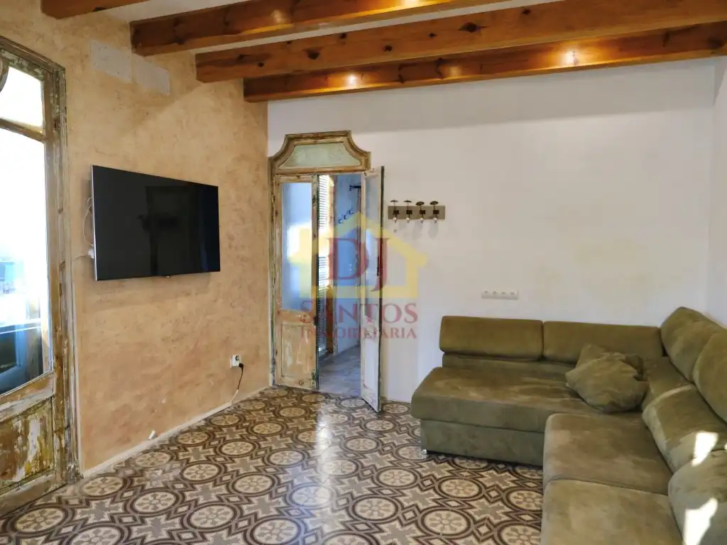 Sala d'estar de Casa adosada en venda en Maó - Mahón