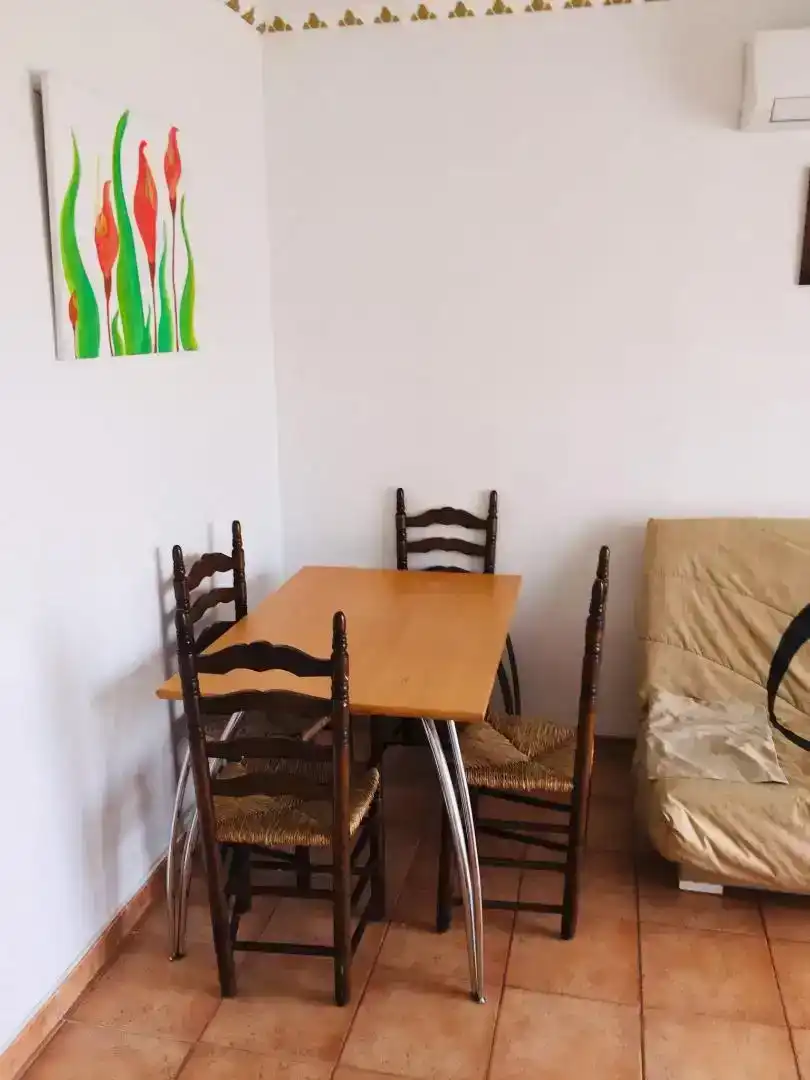 Dining room of Flat for sale in L'Escala  with Air Conditioner and Balcony