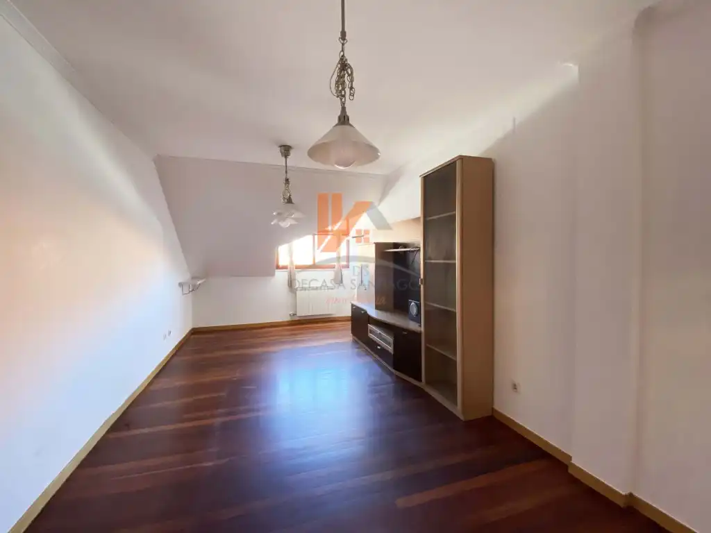 Wohnzimmer von Wohnung zum Verkauf in Ames mit Ofen