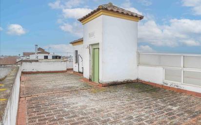 Vista exterior de Casa adosada en venda en Lora del Río amb Terrassa i Traster