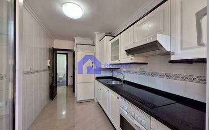 Kitchen of Flat for sale in Oviedo   with Heating, Parquet flooring and Storage room