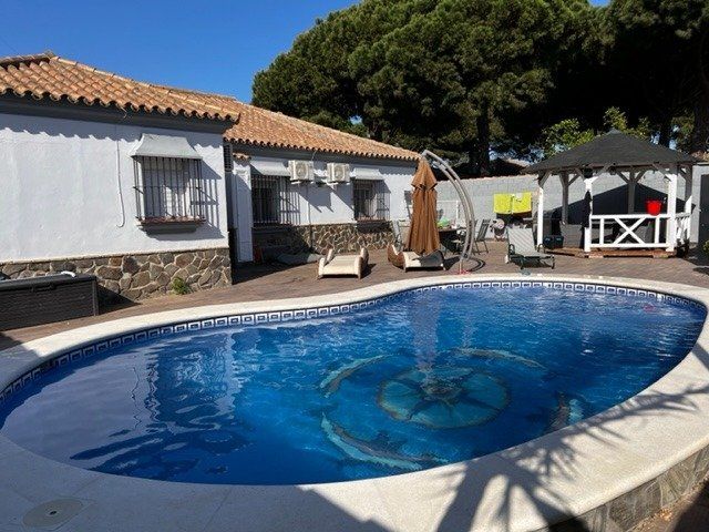 Piscina de Casa o chalet de alquiler en Chiclana de la Frontera con Aire acondicionado, Calefacción y Jardín privado