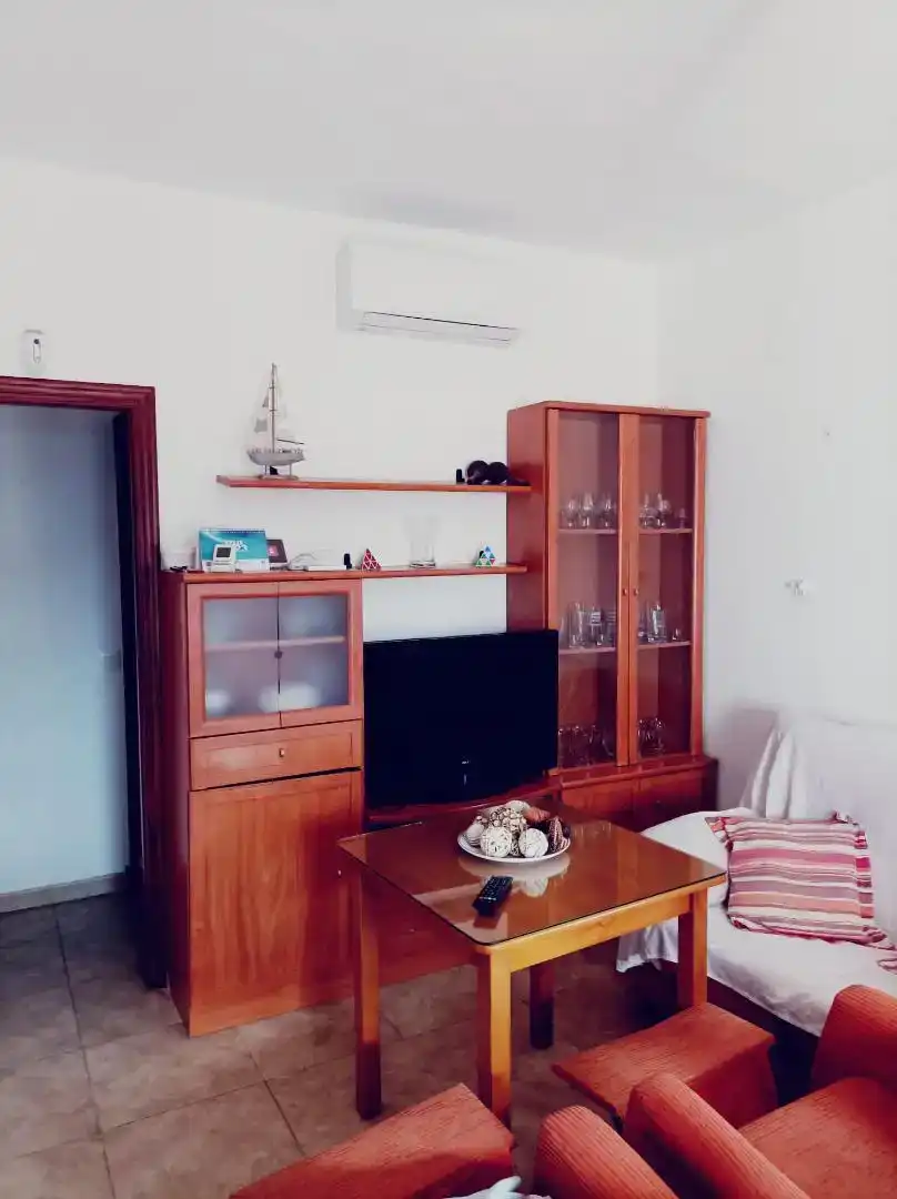 Sala d'estar de Casa o xalet de lloguer en Chipiona amb Aire condicionat, Traster i Moblat