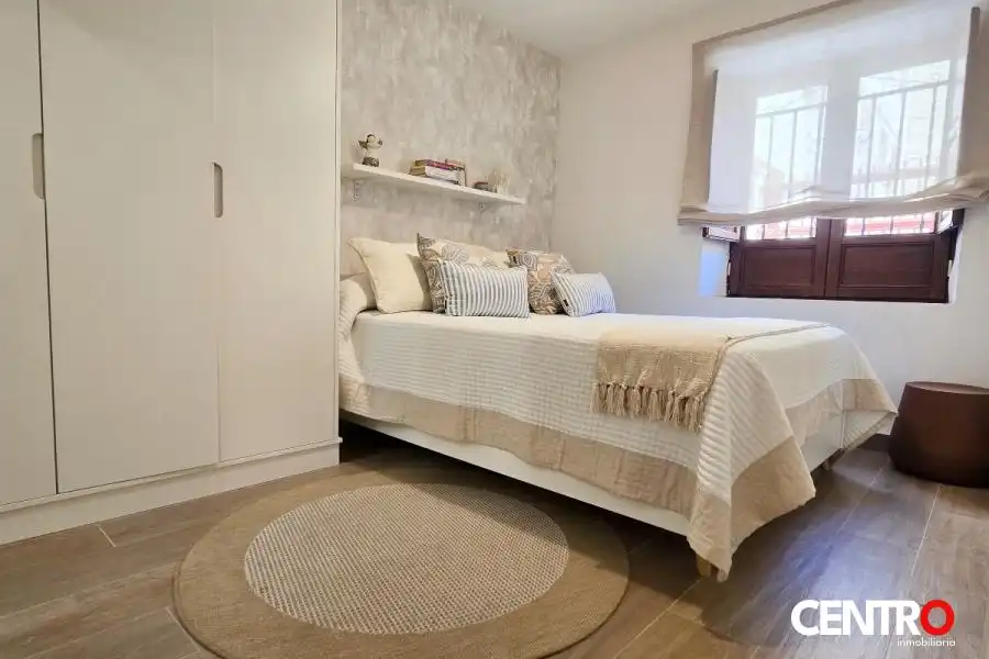 Dormitori de Apartament de lloguer en Granada amb Aire condicionat