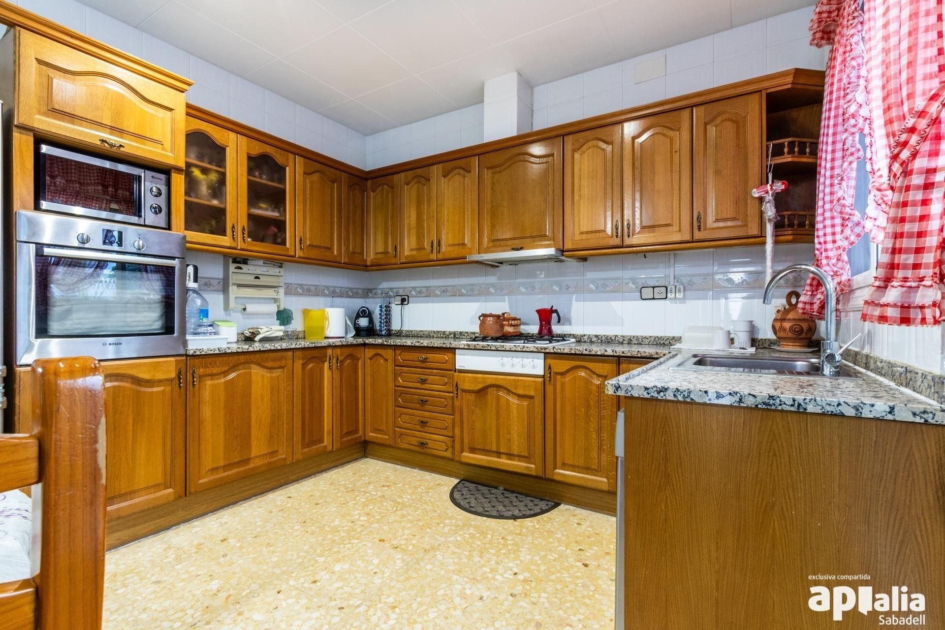 Kitchen of House or chalet for sale in Sabadell  with Air Conditioner, Heating and Terrace