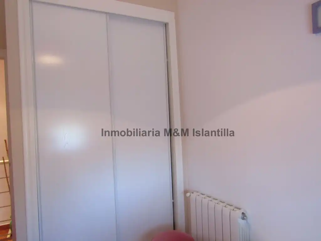 Habitación de Casa adosada en venta en Islantilla con Jardín privado, Terraza y Amueblado