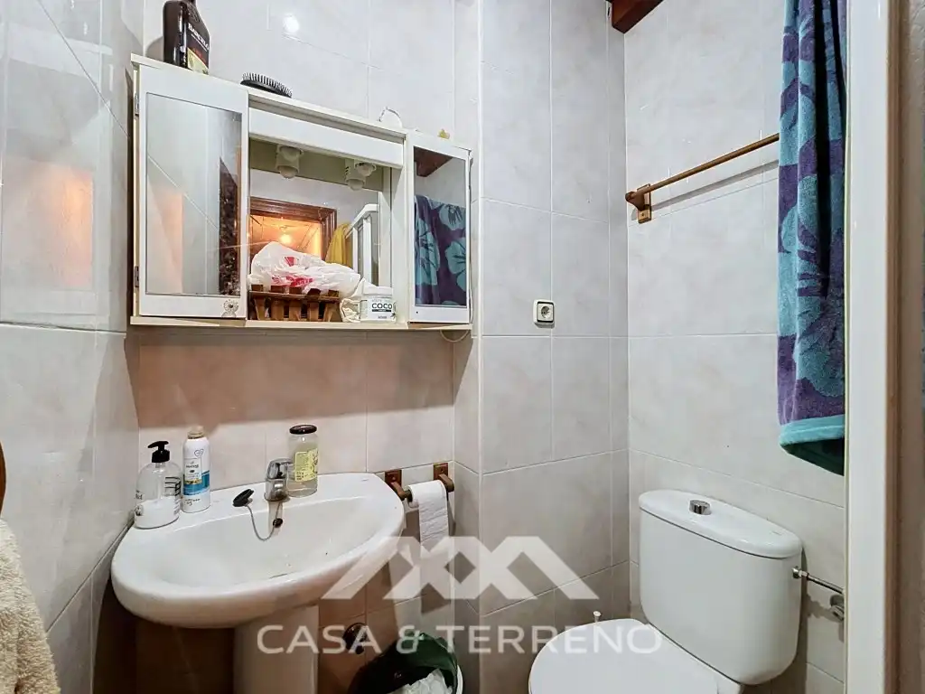 Dormitori de Casa o xalet en venda en El Burgo amb Aire condicionat, Jardí privat i Moblat