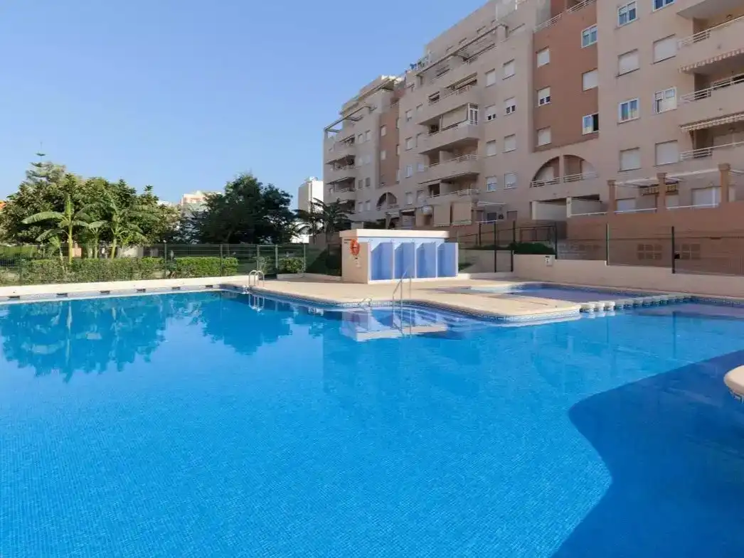 Schwimmbecken von Wohnung zum Verkauf in Gandia mit Klimaanlage, Terrasse und Schwimmbad