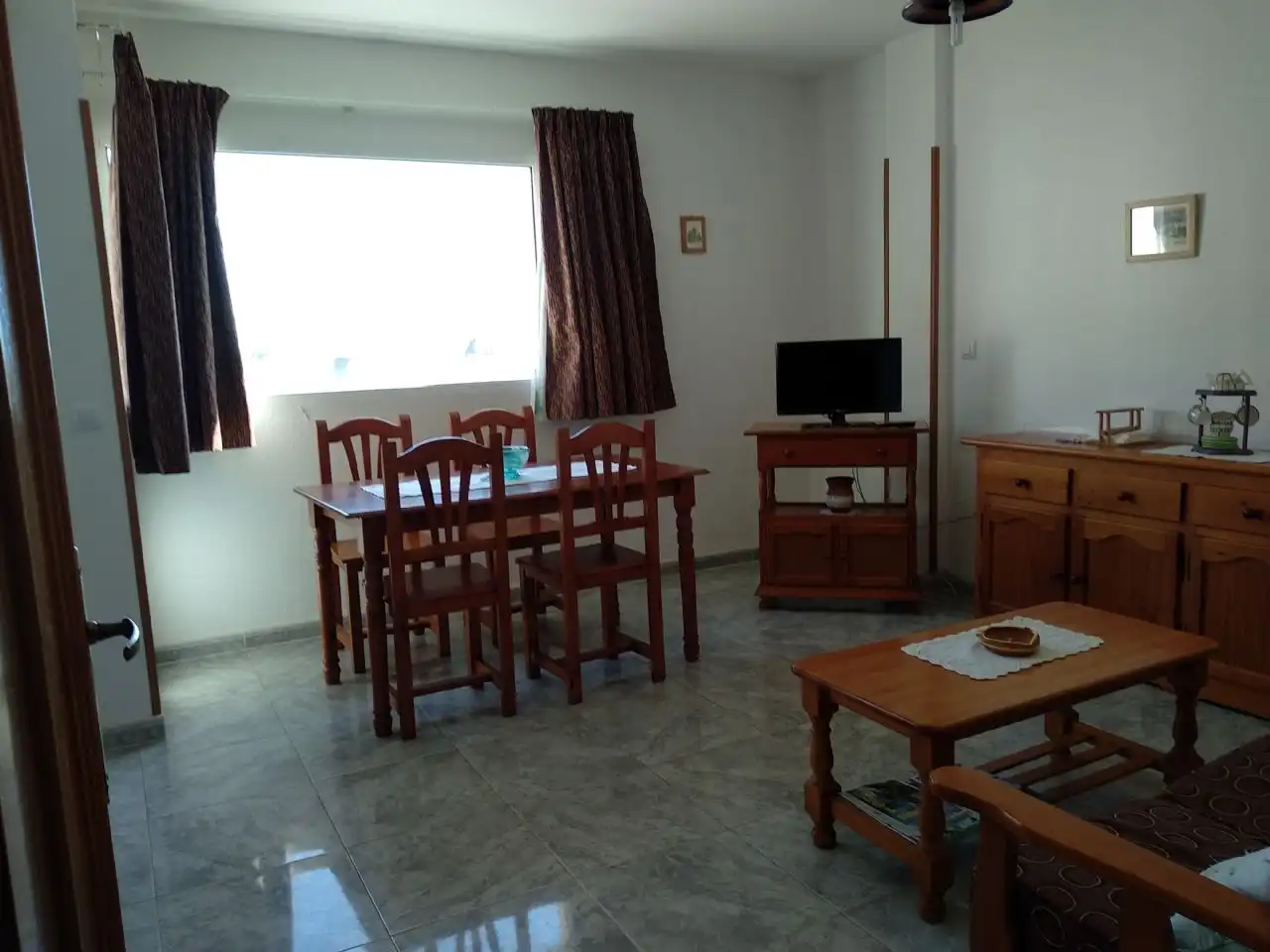 Sala d'estar de Apartament de lloguer en Isla Cristina amb Aire condicionat, Terrassa i Moblat