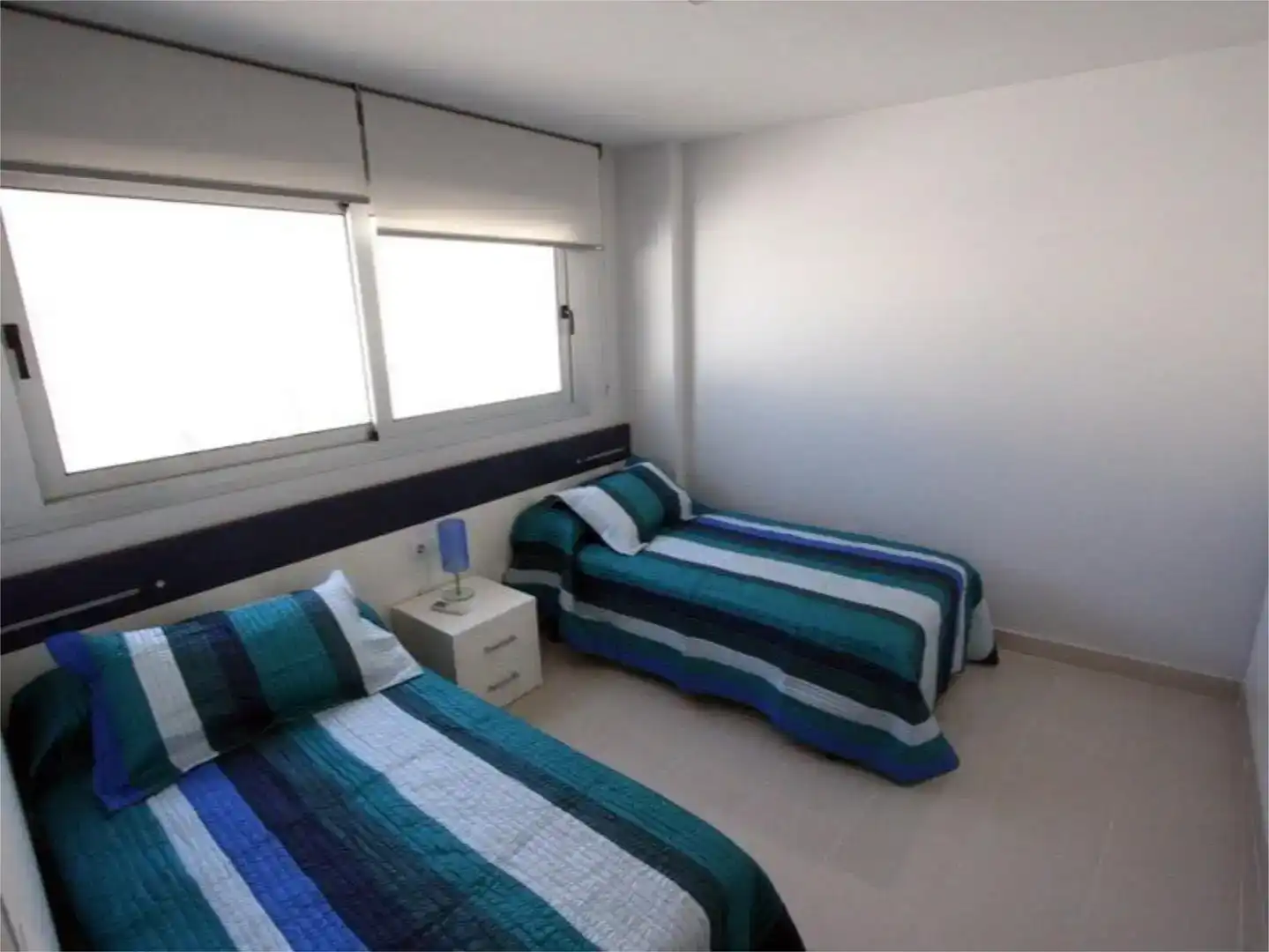 Schlafzimmer von Einfamilien-Reihenhaus zur Miete in Dénia mit Klimaanlage, Privatgarten und Abstellraum