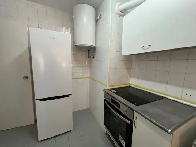 Cuina de Pis de lloguer en Puertollano amb Aire condicionat, Calefacció i Moblat