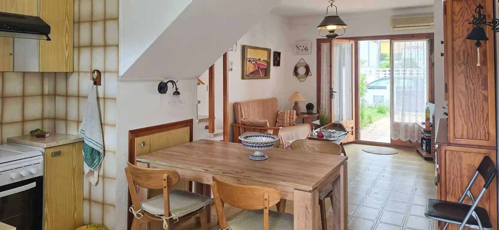 Dining room of Detached homes for sale in L'Escala  with Air Conditioner, Private garden and Terrace