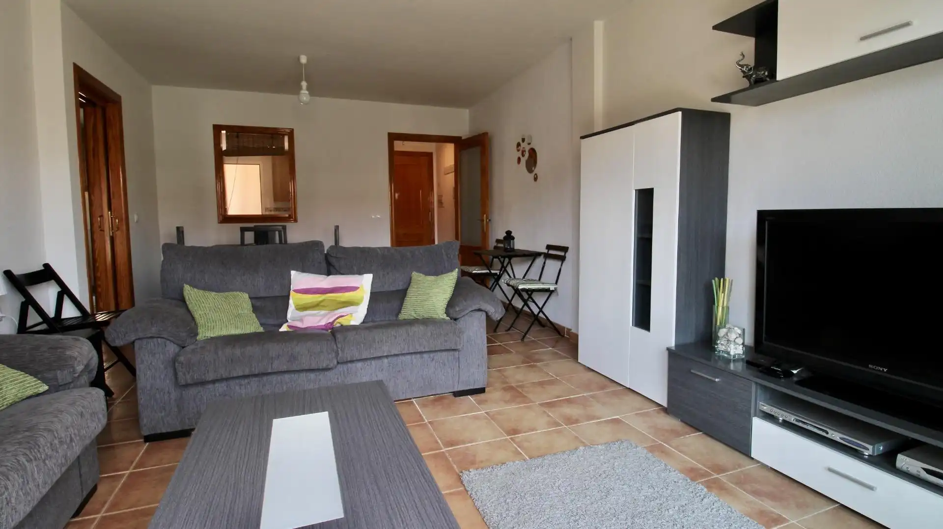 Sala d'estar de Pis en venda en Roquetas de Mar amb Terrassa, Moblat i Piscina comunitària