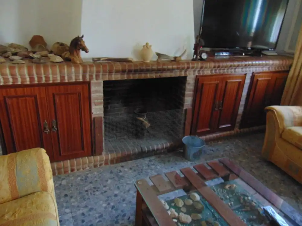 Sala de estar de Finca rústica en venta en Lora del Río con Aire acondicionado, Calefacción y Terraza