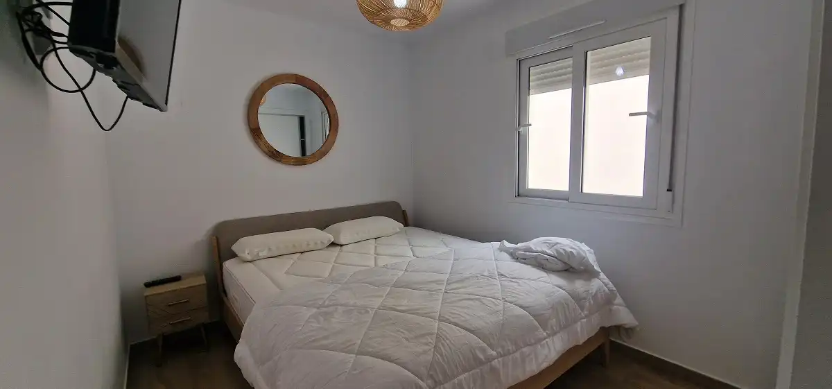 Habitación de Casa adosada de alquiler en Santa Pola con Aire acondicionado, Jardín privado y Amueblado