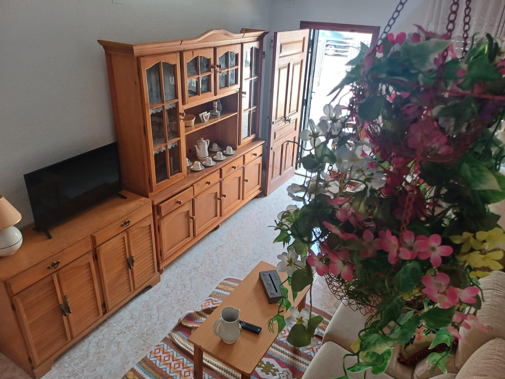 Sala d'estar de Casa adosada en venda en Santa Pola