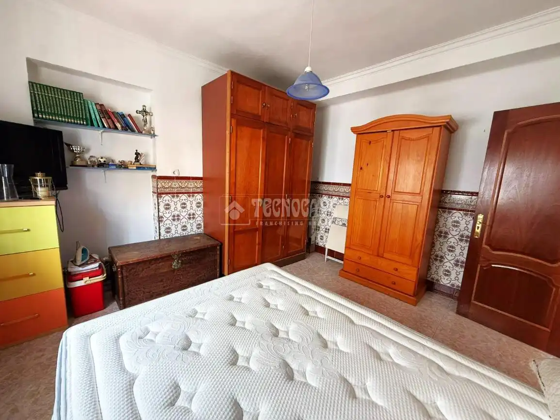 Dormitori de Casa adosada en venda en Málaga amb Jardí privat