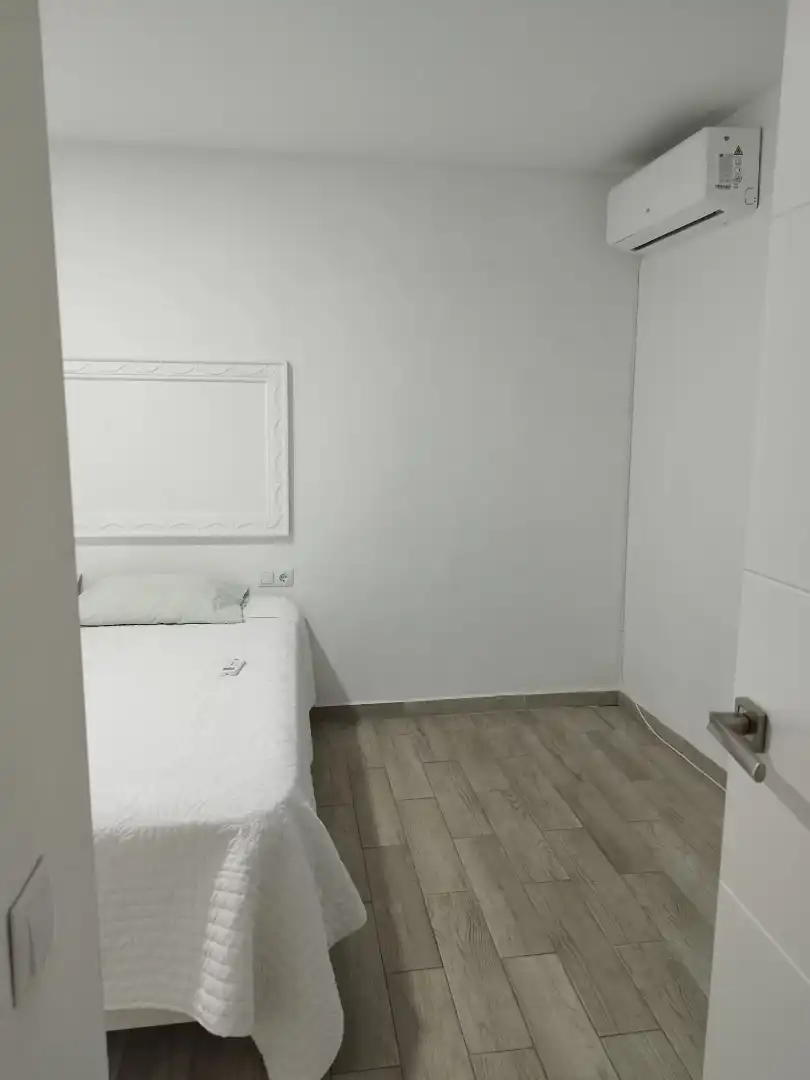 Schlafzimmer von Erdgeschoss zur Miete in Quart de Poblet mit Klimaanlage, Möbliert und Ofen