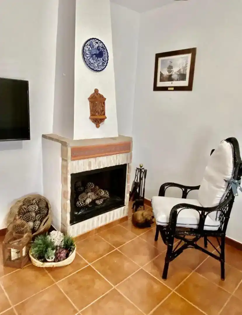 Sala d'estar de Casa adosada en venda en Istán amb Aire condicionat i Balcó
