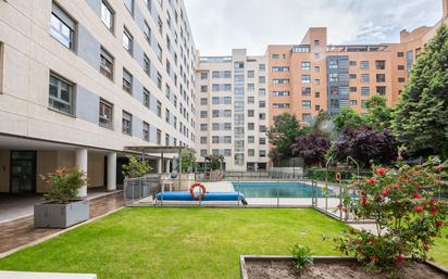Swimming pool of Flat for sale in  Madrid Capital  with Air Conditioner, Heating and Storage room