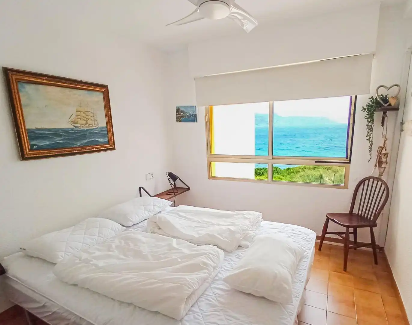 Habitación de Apartamento de alquiler en L'Alfàs del Pi con Aire acondicionado, Jardín privado y Terraza