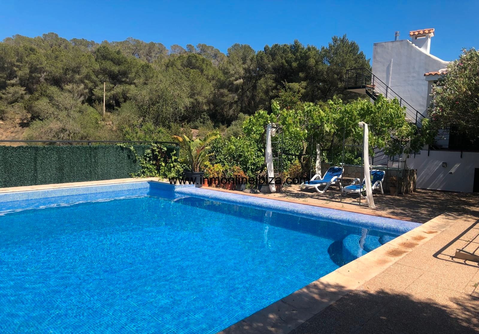 Piscina de Casa o xalet de lloguer en Sant Josep de sa Talaia amb Aire condicionat, Jardí privat i Terrassa