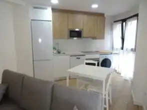 Kitchen of Flat for rent in Gijón   with Heating, Parquet flooring and Storage room