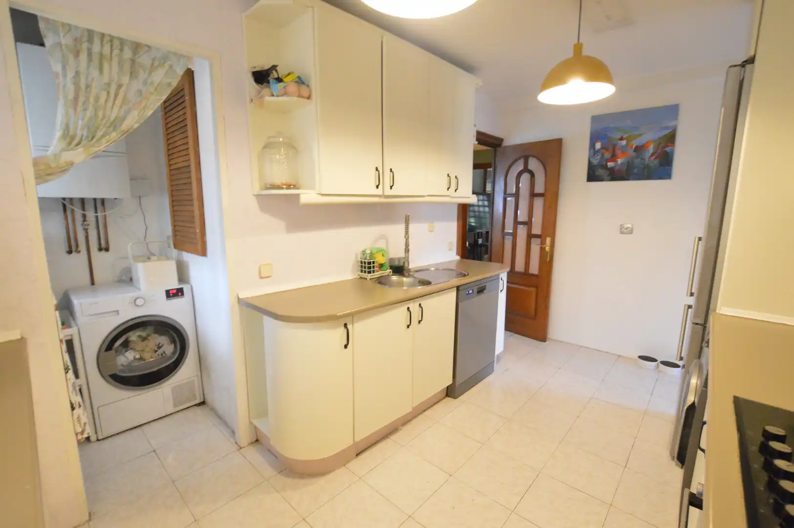 Cocina de Casa adosada en venta en Pozuelo de Alarcón con Aire acondicionado, Calefacción y Jardín privado
