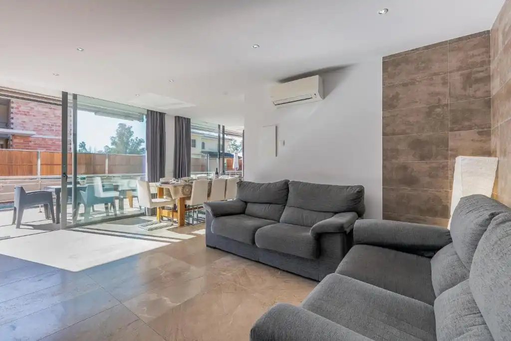 Sala d'estar de Casa o xalet en venda en Muro amb Aire condicionat, Jardí privat i Terrassa