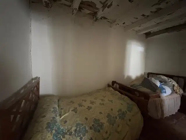 Dormitori de Casa adosada en venda en San Miguel del Arroyo amb Jardí privat