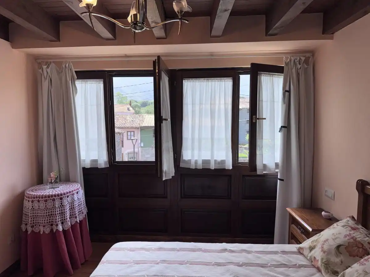 Habitación de Casa adosada en venta en Llanes con Calefacción, Jardín privado y Terraza