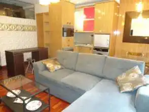 Sala d'estar de Pis de lloguer en Gijón  amb Calefacció, Parquet i Moblat