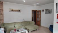 Sala d'estar de Casa o xalet en venda en Olivella amb Calefacció, Jardí privat i Parquet