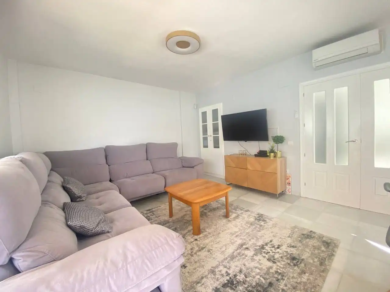 Sala d'estar de Casa o xalet de lloguer en Islantilla amb Aire condicionat, Terrassa i Balcó