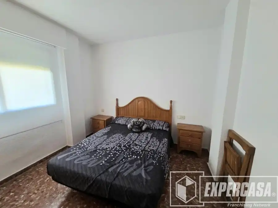 Dormitori de Apartament de lloguer en Cullera amb Terrassa, Piscina i Moblat