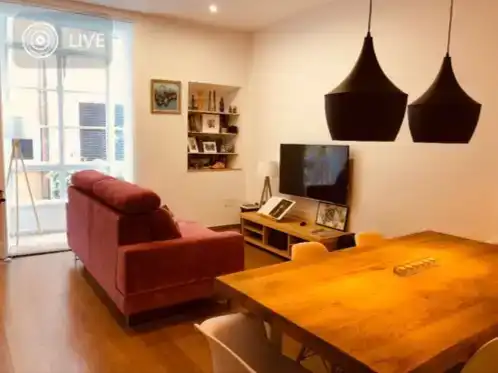 Sala d'estar de Pis de lloguer en  Palma de Mallorca amb Aire condicionat i Balcó