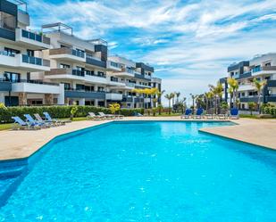 Swimming pool of Flat for sale in Orihuela  with Air Conditioner, Heating and Terrace