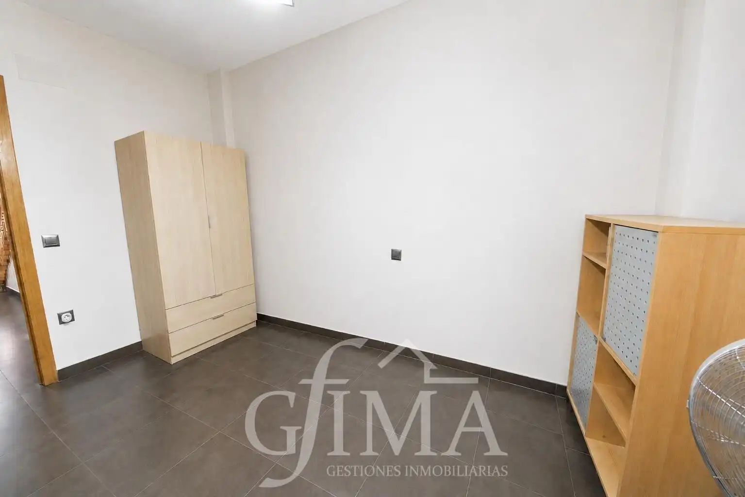 Habitación de Casa adosada en venta en Tomelloso con Calefacción y Amueblado