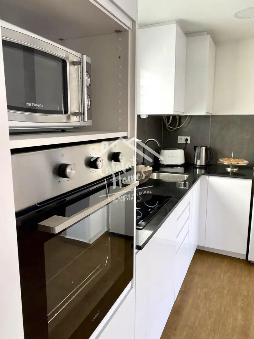 Küche von Wohnung zum Verkauf in L'Ametlla de Mar  mit Klimaanlage und Mikrowelle