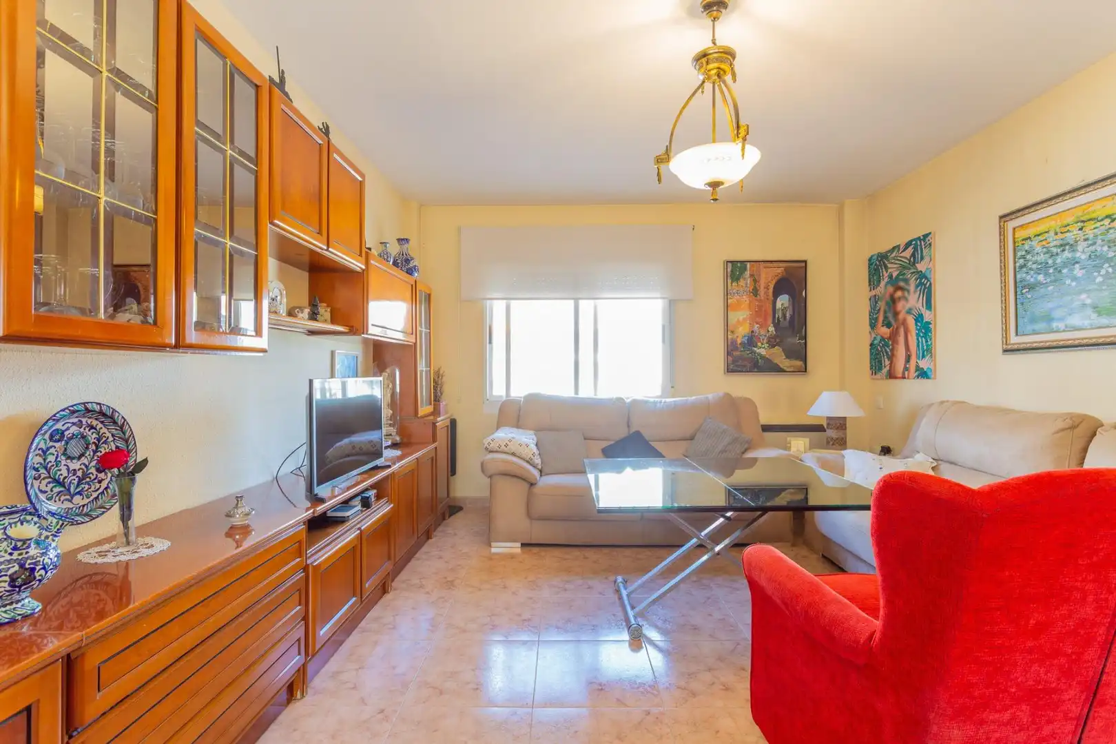 Sala d'estar de Casa adosada en venda en Cúllar Vega amb Aire condicionat, Calefacció i Moblat