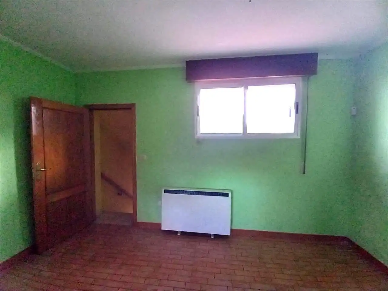 Schlafzimmer von Einfamilien-Reihenhaus zum Verkauf in Os Blancos  mit Heizung
