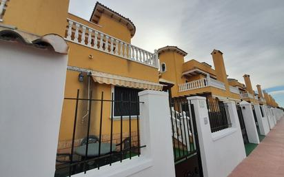 Exterior view of Single-family semi-detached for sale in Rojales  with Air Conditioner and Terrace