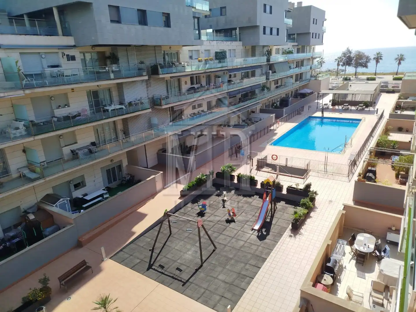 Swimming pool of Flat for sale in Badalona  with Air Conditioner, Heating and Furnished