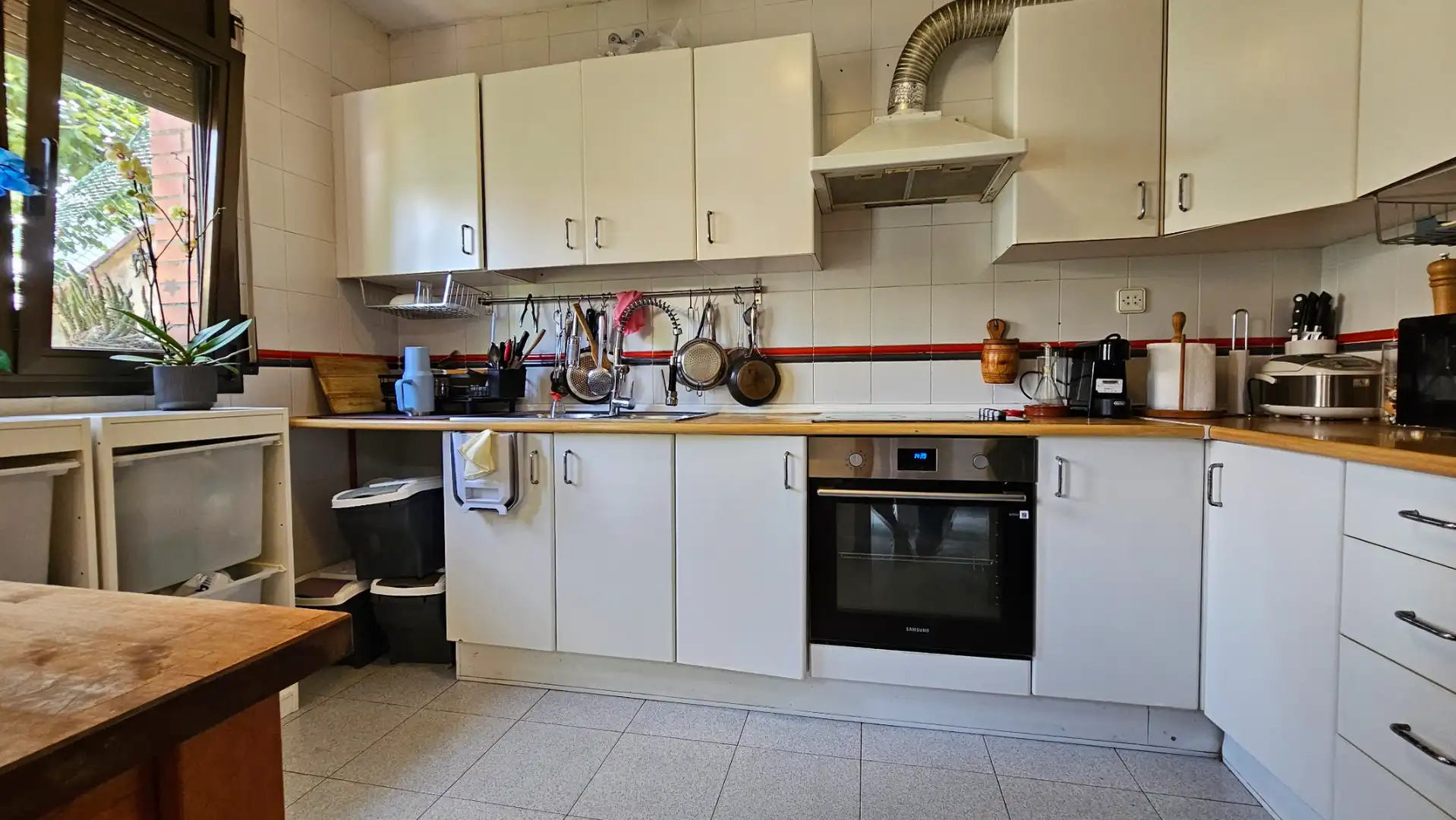 Cuina de Casa adosada en venda en Sabadell amb Calefacció, Terrassa i Forn