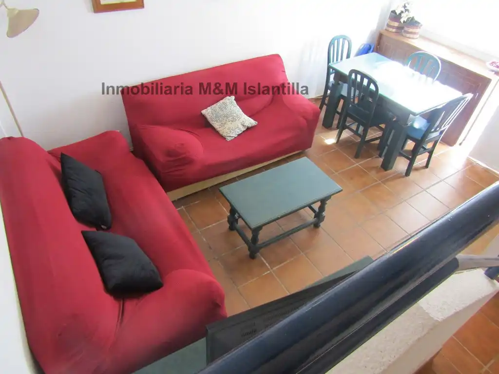 Sala de estar de Casa adosada en venta en Islantilla con Terraza, Trastero y Amueblado